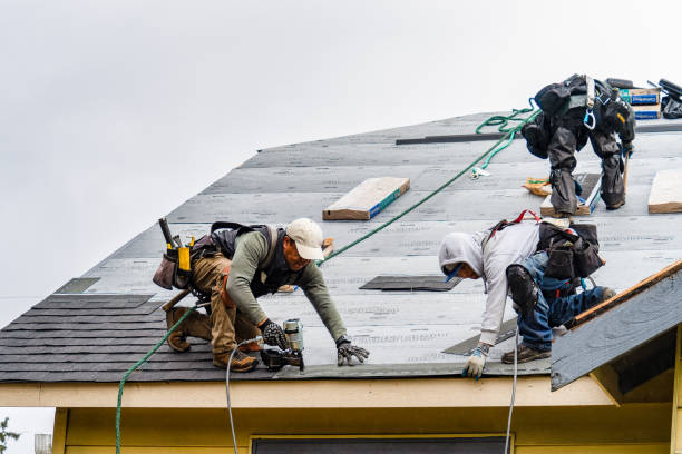 Professional Roofing technician working in Rutland, VT